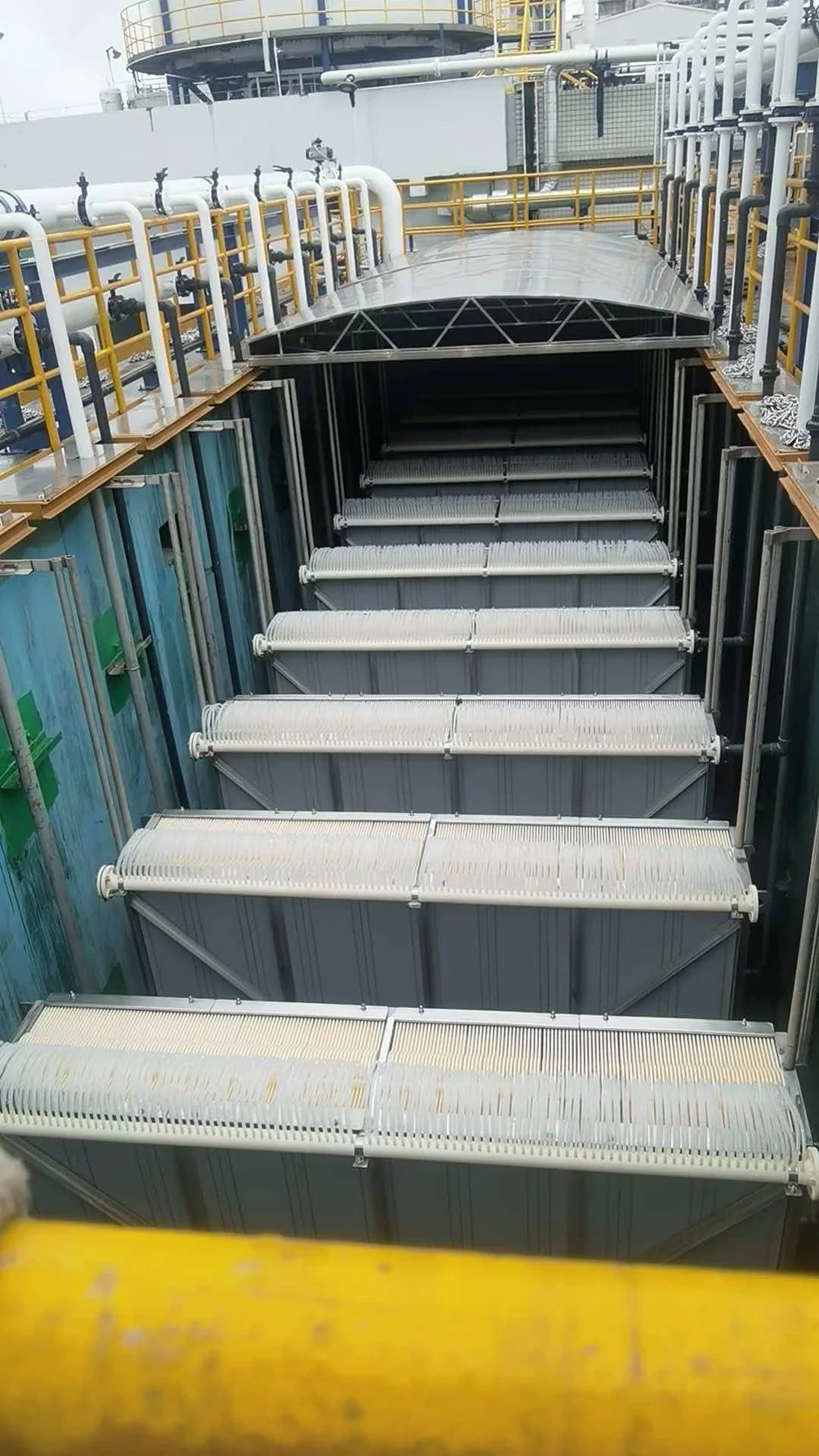 PVDF flat sheet MBR membrane modules in a treatment tank